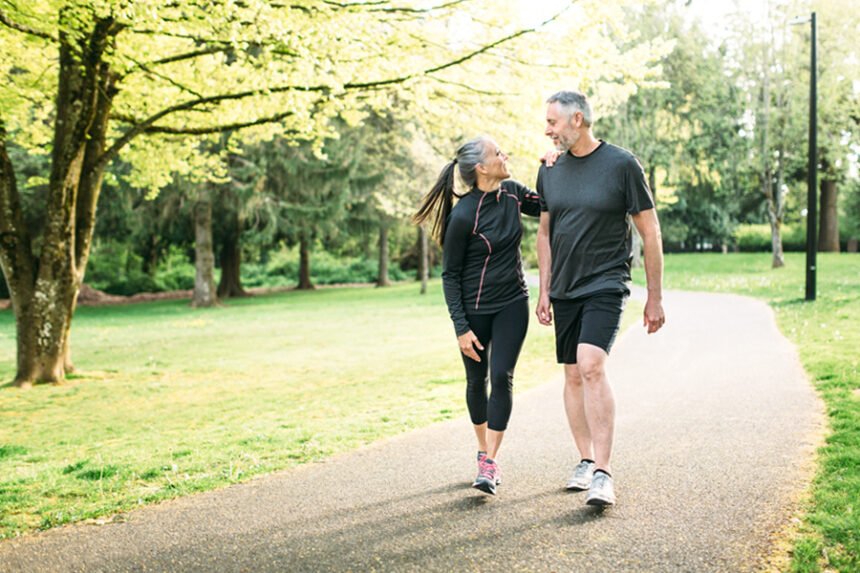 Healthy adults walking in a park